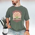 Women's Unearth a Story 2026 Summer Reading Program Flowers Book Men's Comfort Colors T-Shirt Moss