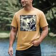 Bigfoot With Alien Reading A Book Bigfoot And UFO Men's Comfort Colors T-Shirt Mustard