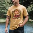 Highland Cow Reading Book Graphic Cow With Book Floral Men's Comfort Colors T-Shirt Mustard Highland Cow Reading Book Graphic Cow With Book Floral Men's Comfort Colors T-Shirt Mustard
