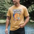 Unearth A Story Rainbow Treasure Book Men's Comfort Colors T-Shirt Mustard Unearth A Story Rainbow Treasure Book Men's Comfort Colors T-Shirt Mustard