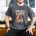 Unearth A Story Rainbow Treasure Book Men's Comfort Colors T-Shirt Pepper Unearth A Story Rainbow Treasure Book Men's Comfort Colors T-Shirt Pepper