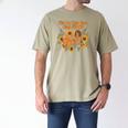 We Do Not Care Club WDNC Reading Book Boho Floral Men's Comfort Colors T-Shirt Khaki We Do Not Care Club WDNC Reading Book Boho Floral Men's Comfort Colors T-Shirt Khaki