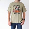 Salem WItch Book Club Halloween Raccoon Witch Reading Book Men's Comfort Colors T-Shirt Khaki Salem WItch Book Club Halloween Raccoon Witch Reading Book Men's Comfort Colors T-Shirt Khaki