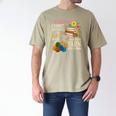 A Woman Cannot Survive On Books Alone She Also Needs Yarn Men's Comfort Colors T-Shirt Khaki A Woman Cannot Survive On Books Alone She Also Needs Yarn Men's Comfort Colors T-Shirt Khaki