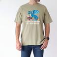 In A World Full Of Bookworms Be A Book Dragon Men's Comfort Colors T-Shirt Khaki In A World Full Of Bookworms Be A Book Dragon Men's Comfort Colors T-Shirt Khaki