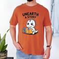 Unearth a Story Cute Dinosaur Summer Reading 2026 Dino Book Men's Comfort Colors T-Shirt Yam Unearth a Story Cute Dinosaur Summer Reading 2026 Dino Book Men's Comfort Colors T-Shirt Yam