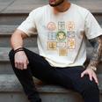 Coquette Boys Of Tommen Books Stamp Tommen College Tees Men's Comfort Colors T-Shirt Ivory Coquette Boys Of Tommen Books Stamp Tommen College Tees Men's Comfort Colors T-Shirt Ivory