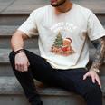 North Pole Book Club Gingerbread Christmas Reading Men's Comfort Colors T-Shirt Ivory North Pole Book Club Gingerbread Christmas Reading Men's Comfort Colors T-Shirt Ivory