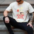 Staying Alive One Book At A Time Skeleton Reading Librarian Men's Comfort Colors T-Shirt Ivory Staying Alive One Book At A Time Skeleton Reading Librarian Men's Comfort Colors T-Shirt Ivory
