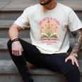 Unearth a Story 2026 Summer Reading Program Flowers Book Men's Comfort Colors T-Shirt Ivory