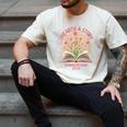Women's Unearth a Story 2026 Summer Reading Program Flowers Book Men's Comfort Colors T-Shirt Ivory