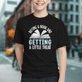 Buying A Book And Getting A Little Treat Graphic Youth Buying A Book And Getting A Little Treat Graphic Youth