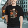 Read In Peace Skeleton Reading Book Halloween Teacher Graphic Youth