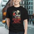 Staying Alive One Book At A Time Skeleton Reading Librarian Graphic Youth