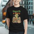 Unearth a Story Triceratops Dinosaur Reading Books Cute Dino Graphic Youth Unearth a Story Triceratops Dinosaur Reading Books Cute Dino Graphic Youth