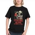 Staying Alive One Book At A Time Skeleton Reading Librarian Graphic Youth