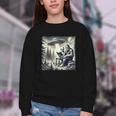 Bigfoot With Alien Reading A Book Bigfoot And UFO Youth Crewneck Sweatshirt