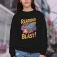 Book Lover Kids And Adults Reading Is a Blast Rocket Ship Youth Crewneck Sweatshirt Book Lover Kids And Adults Reading Is a Blast Rocket Ship Youth Crewneck Sweatshirt