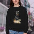 Cat Sitting On Books Youth Crewneck Sweatshirt Cat Sitting On Books Youth Crewneck Sweatshirt
