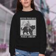 Defend Your Local Library Knight Cat Rider Book Lover Youth Crewneck Sweatshirt Defend Your Local Library Knight Cat Rider Book Lover Youth Crewneck Sweatshirt