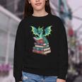 Dragon Reading Books Fantasy Lovers Mythical Creatures Youth Crewneck Sweatshirt Dragon Reading Books Fantasy Lovers Mythical Creatures Youth Crewneck Sweatshirt
