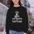 Easily Distracted By Plants & Books Plant Book Lover Youth Crewneck Sweatshirt