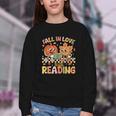 Fall In Love With Reading Autumn Pumpkin Teacher Book Lover Youth Crewneck Sweatshirt