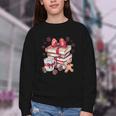 Girly Coquette Gingerbread Books And Hot Cocoa Cozy Season Youth Crewneck Sweatshirt Girly Coquette Gingerbread Books And Hot Cocoa Cozy Season Youth Crewneck Sweatshirt