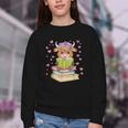 Highland Cow Reading Book Floral Bookworm Youth Crewneck Sweatshirt Highland Cow Reading Book Floral Bookworm Youth Crewneck Sweatshirt