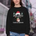 Most Likely To Read A Book On Christmas Love Reading Books Youth Crewneck Sweatshirt