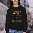 Reading Is Self Care Mental Health Read More Book Youth Crewneck Sweatshirt Reading Is Self Care Mental Health Read More Book Youth Crewneck Sweatshirt