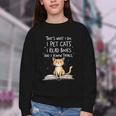That's What I Do I Pet Cats I Read Books And I Know Things Youth Crewneck Sweatshirt