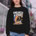 Unearth A Story Rainbow Treasure Book Youth Crewneck Sweatshirt