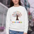 100 Days In The Books Reading Teacher 100th Day Of School Premium Tri-Blend Youth Crewneck Sweatshirt