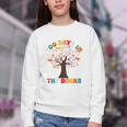 100 Days In The Books Reading Teacher 100th Day Of School Premium Youth Crewneck Sweatshirt