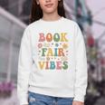 Book Fair Vibes Groovy Retro School Reading Nostalgic Youth Crewneck Sweatshirt Book Fair Vibes Groovy Retro School Reading Nostalgic Youth Crewneck Sweatshirt
