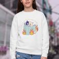 Cat Reading a Romance BookI Like My Books Extra Spicy Youth Crewneck Sweatshirt
