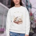 Coffee Cats & Books Cute Cat Book Lover Reading Youth Crewneck Sweatshirt Coffee Cats & Books Cute Cat Book Lover Reading Youth Crewneck Sweatshirt