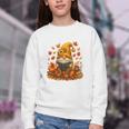 Cute Autumn Gnome Reading Pumpkin Book Lover Youth Crewneck Sweatshirt