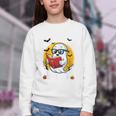 Cute Ghost Reading Book Retro Halloween Librarian Youth Crewneck Sweatshirt