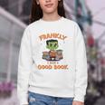 Cute Halloween Teacher Librarian Frankenstein Reading Books Youth Crewneck Sweatshirt Cute Halloween Teacher Librarian Frankenstein Reading Books Youth Crewneck Sweatshirt