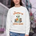 Cute Halloween Teacher Librarian Mummy Reading Books Youth Crewneck Sweatshirt