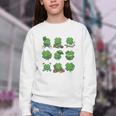 Cute Shamrock Reading St Patricks Day Teacher Book Lovers Youth Crewneck Sweatshirt Cute Shamrock Reading St Patricks Day Teacher Book Lovers Youth Crewneck Sweatshirt
