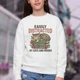 Easily Distracted By Cats And Books Vintage Youth Crewneck Sweatshirt Easily Distracted By Cats And Books Vintage Youth Crewneck Sweatshirt