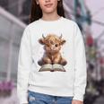Highland Cow Reading Book Bookworm Youth Crewneck Sweatshirt