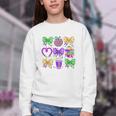 Mardi Gras Teacher Coquette Bow Pencil Apple Book Women Girl Youth Crewneck Sweatshirt Mardi Gras Teacher Coquette Bow Pencil Apple Book Women Girl Youth Crewneck Sweatshirt