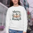 Merry And Booked Holiday Reading Winter Book Lover Premium Tri-Blend Youth Crewneck Sweatshirt