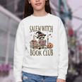 Salem Witch Book Club Raccoon Reading Youth Crewneck Sweatshirt Salem Witch Book Club Raccoon Reading Youth Crewneck Sweatshirt