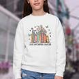 Wildflower Floral Book Just One More Chapter Youth Crewneck Sweatshirt Wildflower Floral Book Just One More Chapter Youth Crewneck Sweatshirt
