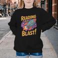 Book Lover Kids And Adults Reading Is a Blast Rocket Ship Youth Crewneck Sweatshirt Book Lover Kids And Adults Reading Is a Blast Rocket Ship Youth Crewneck Sweatshirt